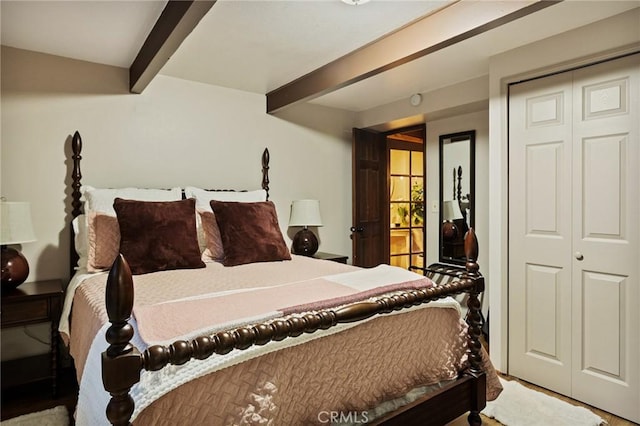 31353 Lightfoot Way, Running Springs, CA 92382 - bedroom featuring beamed ceiling and a closet