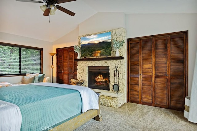31353 Lightfoot Way, Running Springs, CA 92382 - carpeted bedroom featuring vaulted ceiling, a stone fireplace, and ceiling fan