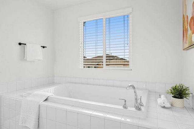 bathroom with a garden tub