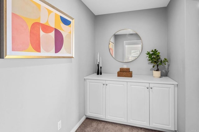 interior space with baseboards