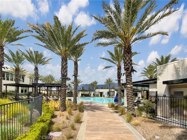 11032 Momentum Dr, Rancho Cucamonga, CA 91730 - view of community featuring a swimming pool and fence