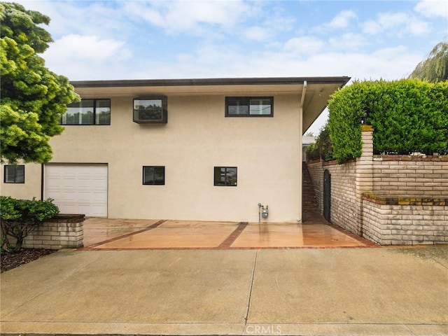 exterior space with stucco siding