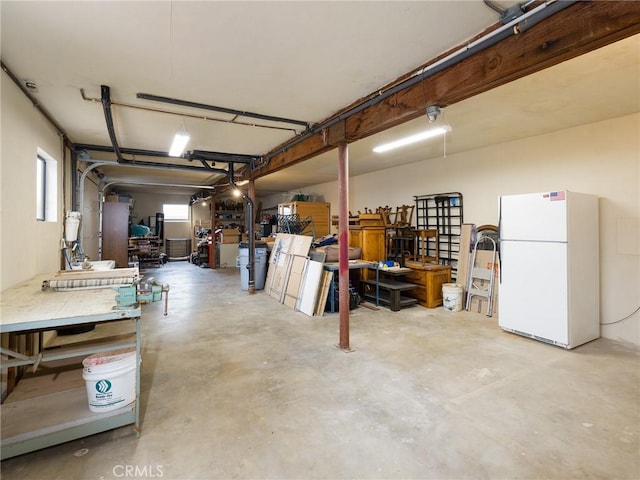 garage featuring freestanding refrigerator