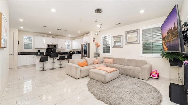 16763 Stags Leap Ln, Fontana, CA 92336 - living area with recessed lighting and baseboards