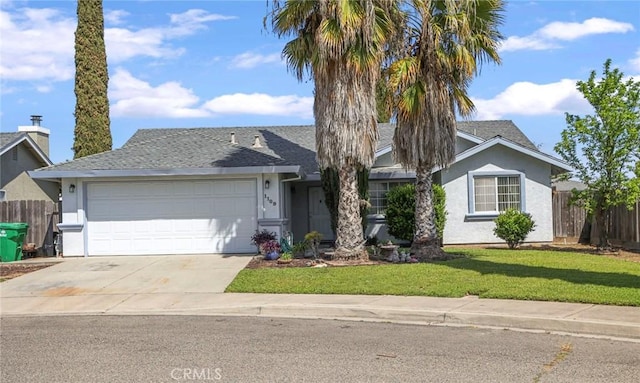ranch-style house featuring stucco siding, fence, driveway, a front yard, and a garage