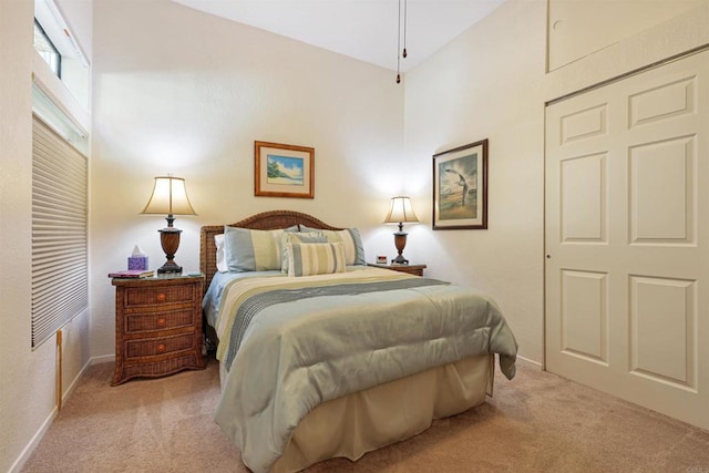 carpeted bedroom with baseboards