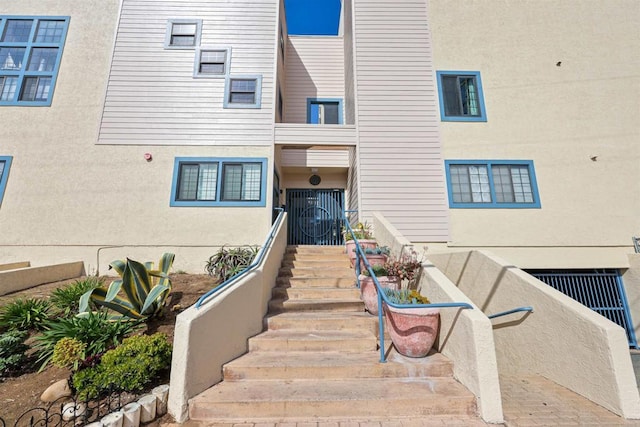 exterior space featuring stucco siding