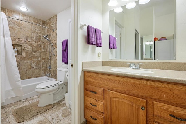 bathroom featuring vanity, toilet, tile patterned flooring, and shower / tub combo