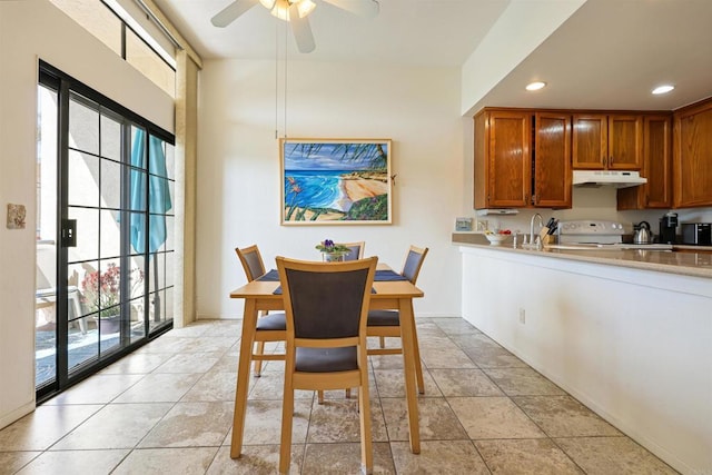 dining area with light tile patterned floors, recessed lighting, baseboards, and ceiling fan