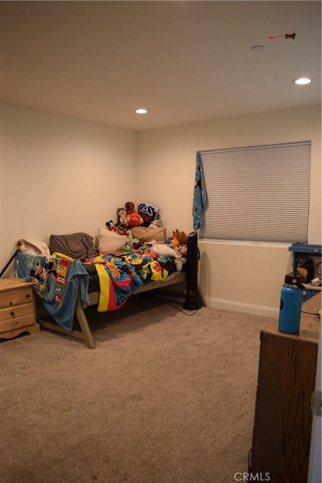 bedroom with carpet flooring and recessed lighting