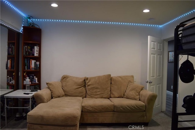 carpeted living room with recessed lighting