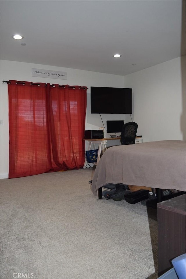 bedroom featuring recessed lighting and carpet flooring