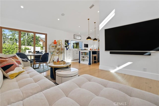 1954 Port Locksleigh Pl, Newport Beach, CA 92660 - living area with light wood finished floors, high vaulted ceiling, and recessed lighting