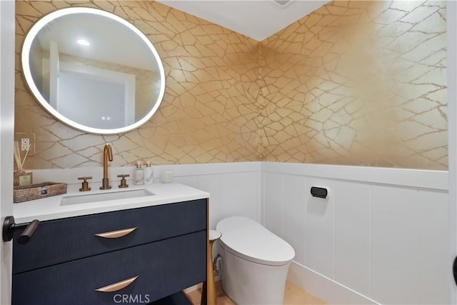 1954 Port Locksleigh Pl, Newport Beach, CA 92660 - half bathroom with vanity, toilet, a decorative wall, and wainscoting