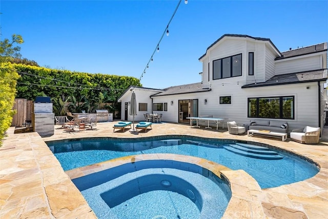1954 Port Locksleigh Pl, Newport Beach, CA 92660 - view of pool with outdoor lounge area, a patio area, and a pool with connected hot tub