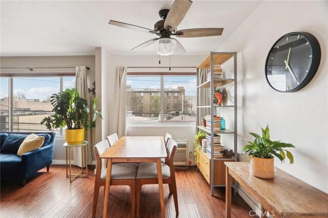 sunroom with a wall mounted air conditioner