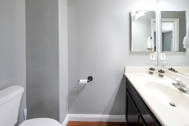 25318 Kerri Ln, Ramona, CA 92065 - bathroom with baseboards, a textured wall, toilet, and vanity