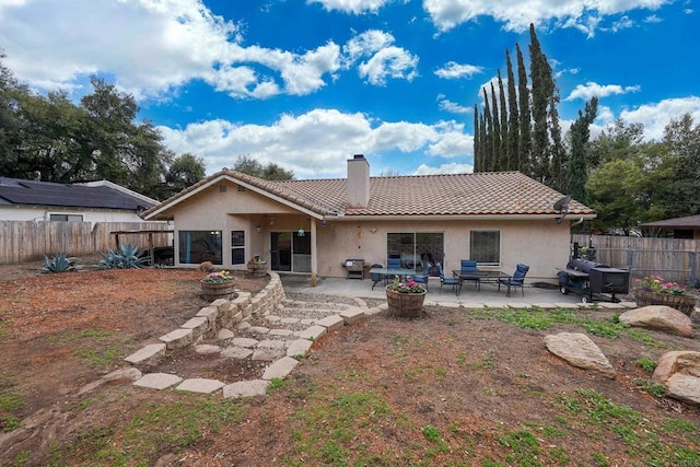 25318 Kerri Ln, Ramona, CA 92065 - rear view of property with a chimney, stucco siding, a tiled roof, and a patio