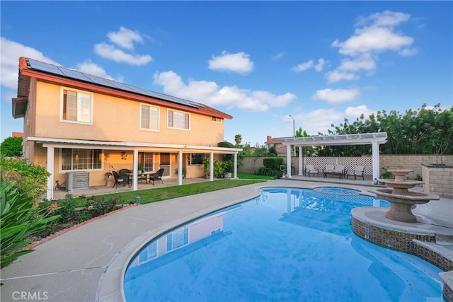view of pool with a fenced backyard, a fenced in pool, a pergola, central AC, and a patio area
