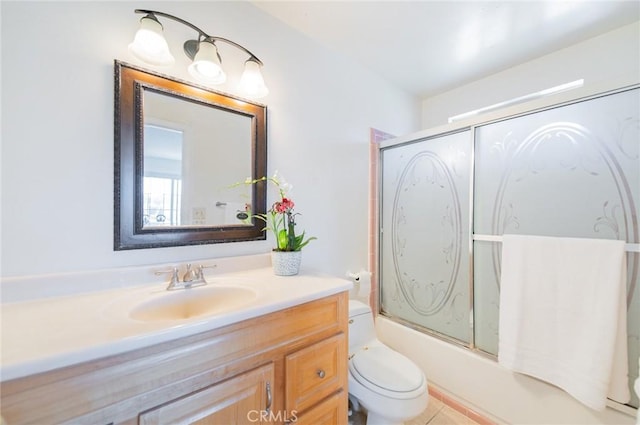 full bath with shower / bath combination with glass door, toilet, and vanity