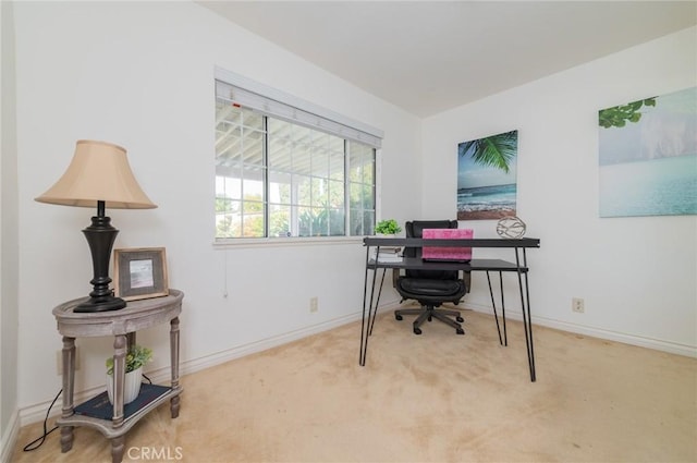 office area featuring carpet floors and baseboards