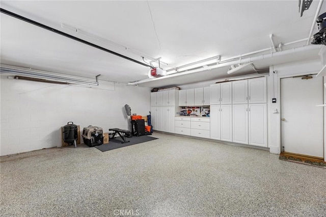 23163 Mulholland Dr Unit 6, Woodland Hills, CA 91364 - garage featuring a garage door opener