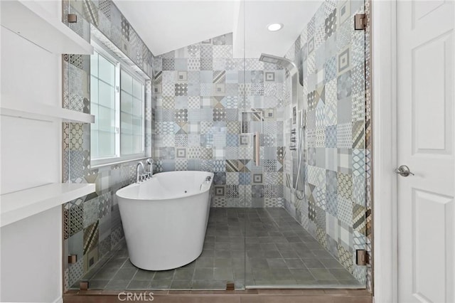 23163 Mulholland Dr Unit 6, Woodland Hills, CA 91364 - bathroom with a shower stall, tile walls, a freestanding tub, and tile patterned floors