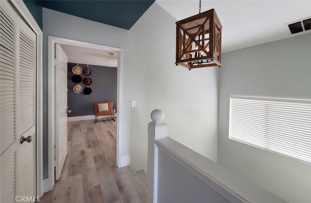 2512 Santa Ana Ave Unit 9, Costa Mesa, CA 92627 - hall featuring an upstairs landing and light wood-style flooring