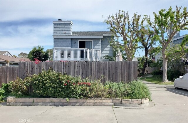 2512 Santa Ana Ave Unit 9, Costa Mesa, CA 92627 - view of front of home featuring a chimney