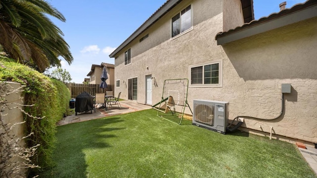 back of house with a patio area, ac unit, stucco siding, and fence