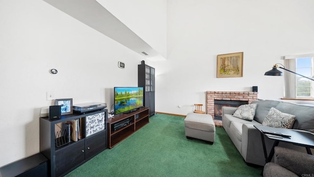 carpeted living room with a high ceiling, a brick fireplace, and visible vents