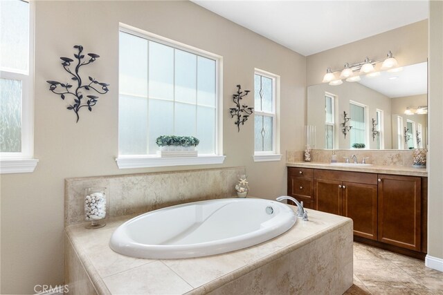 34595 Collier Falls Ct, Temecula, CA 92592 - bathroom featuring vanity and a bath