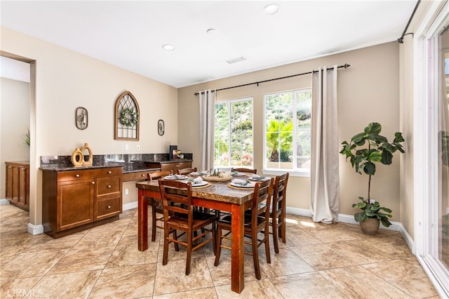 34595 Collier Falls Ct, Temecula, CA 92592 - dining room with recessed lighting and light tile patterned floors