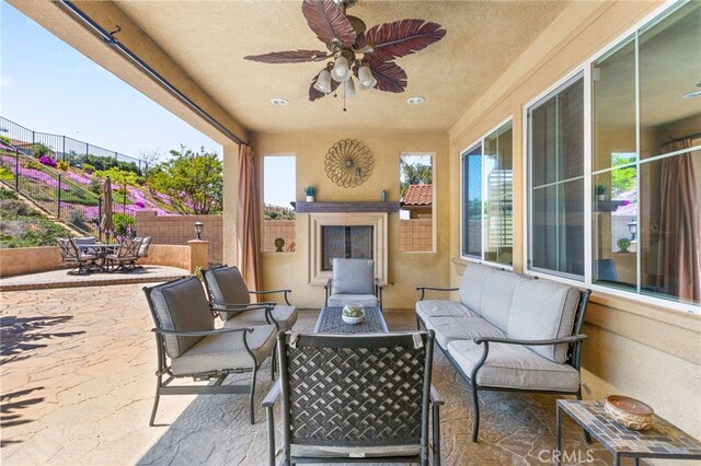 34595 Collier Falls Ct, Temecula, CA 92592 - view of patio / terrace featuring outdoor lounge area, outdoor dining space, and a ceiling fan