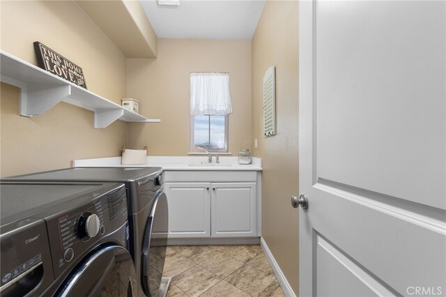 34595 Collier Falls Ct, Temecula, CA 92592 - washroom with washer and clothes dryer and cabinet space