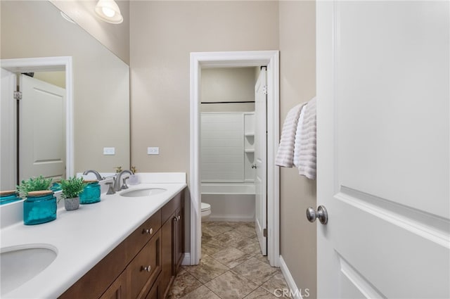34595 Collier Falls Ct, Temecula, CA 92592 - full bathroom featuring double vanity and toilet
