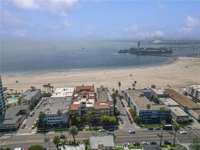 aerial view with a beach view and a water view