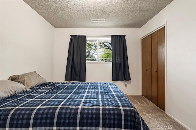 295 Chestnut Ave, Red Bluff, CA 96080 - bedroom with carpet floors and a textured ceiling