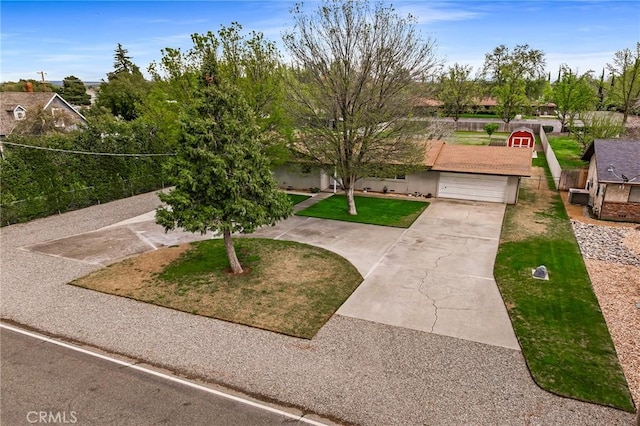 295 Chestnut Ave, Red Bluff, CA 96080 - exterior space featuring driveway and a lawn