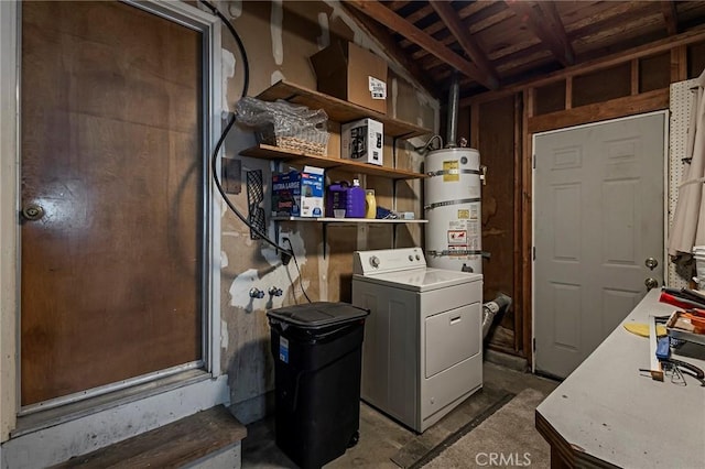 295 Chestnut Ave, Red Bluff, CA 96080 - washroom featuring strapped water heater, washer / clothes dryer, and laundry area