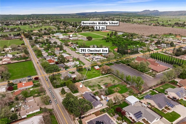 295 Chestnut Ave, Red Bluff, CA 96080 - drone / aerial view featuring a residential view and a mountain view