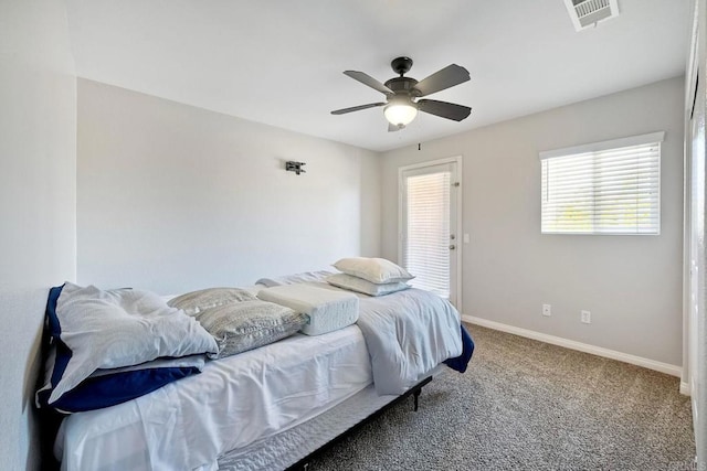 1140 Parkview Dr, Oceanside, CA 92057 - carpeted bedroom with baseboards and a ceiling fan