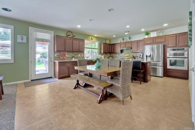 1140 Parkview Dr, Oceanside, CA 92057 - dining space featuring recessed lighting, light tile patterned floors, and baseboards
