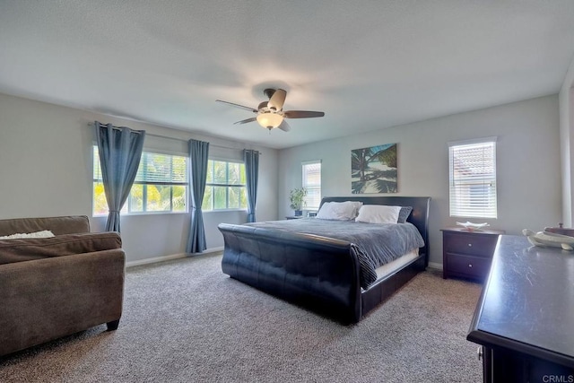1140 Parkview Dr, Oceanside, CA 92057 - carpeted bedroom with baseboards and ceiling fan