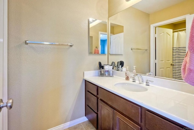 1140 Parkview Dr, Oceanside, CA 92057 - bathroom featuring vanity, tile patterned floors, and baseboards