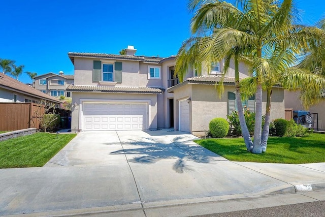 1140 Parkview Dr, Oceanside, CA 92057 - view of front facade with a garage, stucco siding, a chimney, concrete driveway, and a tiled roof