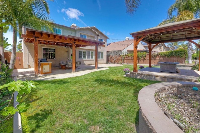 1140 Parkview Dr, Oceanside, CA 92057 - view of yard featuring a gazebo, a fire pit, and a patio area