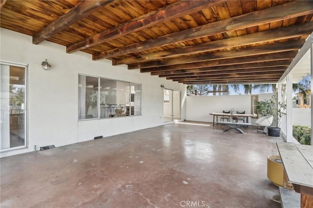 view of patio with fence and outdoor dining area