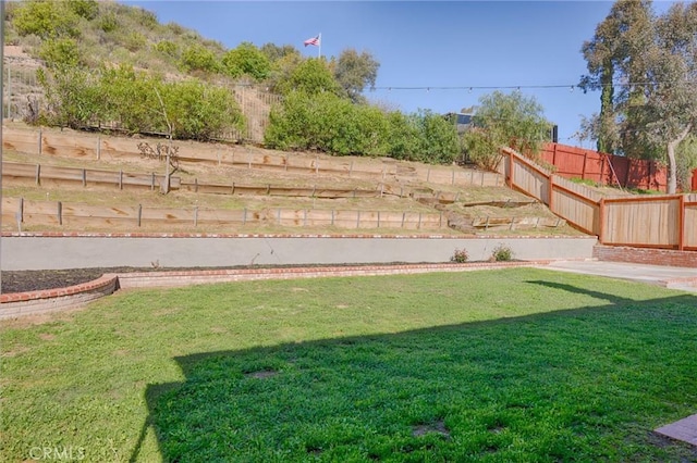 view of yard with fence