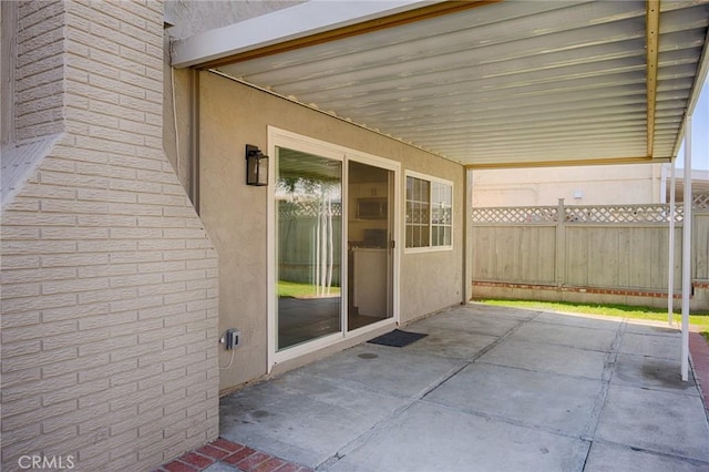view of patio / terrace with fence